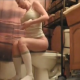 A blonde girl sits on a toilet and has some wet farts and some diarrhea. When finished, she gets up, cleans her has with her hands after wetting them in the sink, and towel dries her ass.